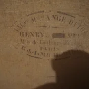 Close-up of the circular canvas supplier stamp on the reverse, reading Henry, Paris, French art supplier mark