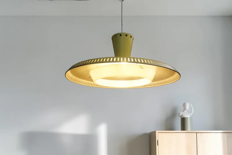 Philips NB92/93 pendant lamp lit, studio shot, plastic glass ring glowing inside shade