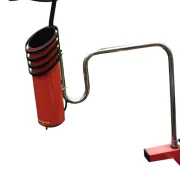 Ateljé Lyktan Skarabé clamp lamp side view, original manufacturer label visible, salmon cylinder with black ribbed rings